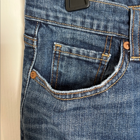 Levi's 515 Dark Blue Boot Cut Mid-Rise Slight Distressing Jeans - Picture 4 of 9